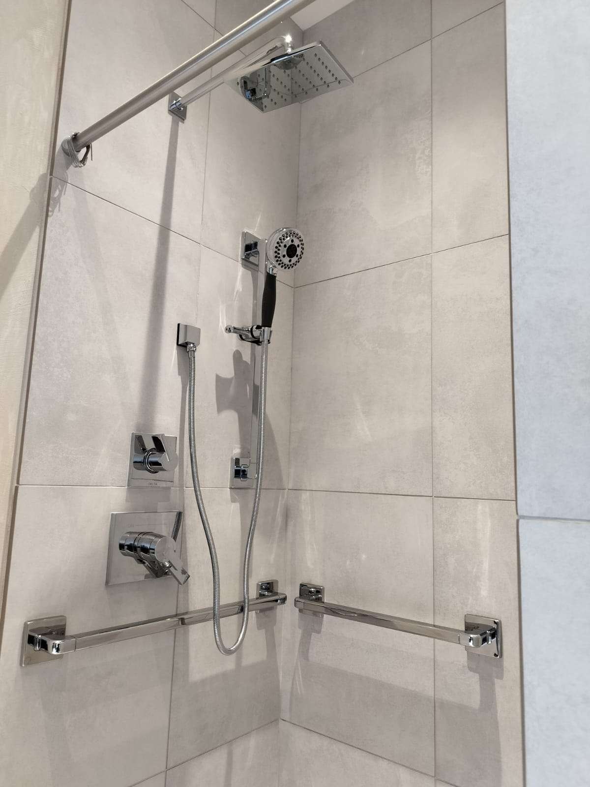 Cleaned shower with rainfall head. Photo from Lauri’s site.